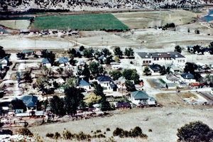 Aerial of school, homes, and baseball field